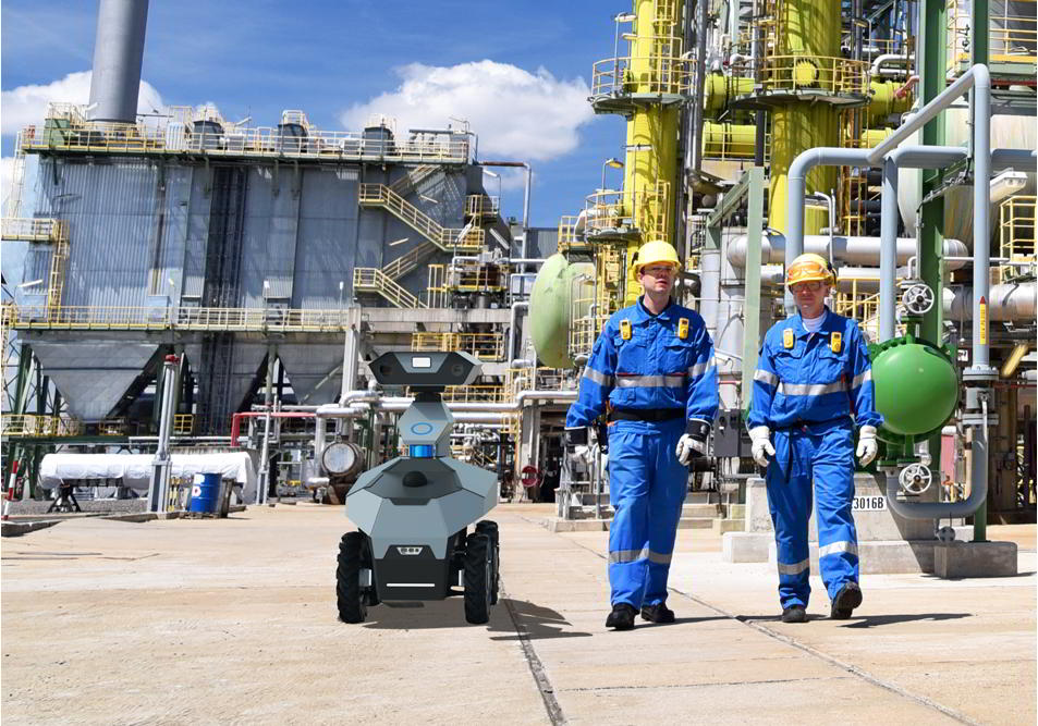 The GR100 autonomous mobile robot in an inspection area with engineers